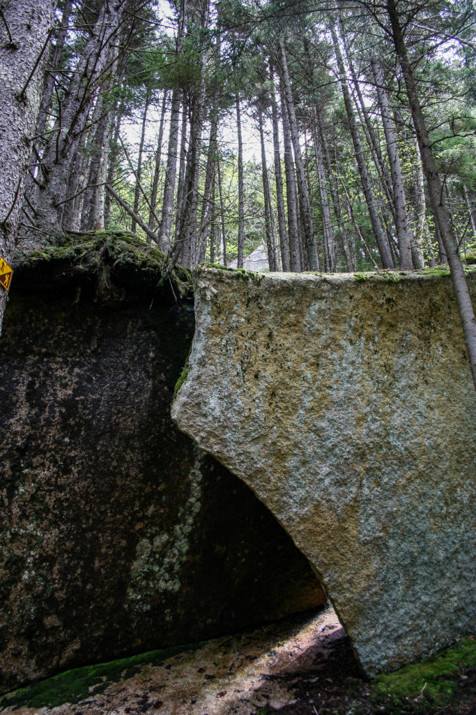 Giant rock slabs with a gap between them.
 Sentier des Escarpments 
 Mont Megantic 
